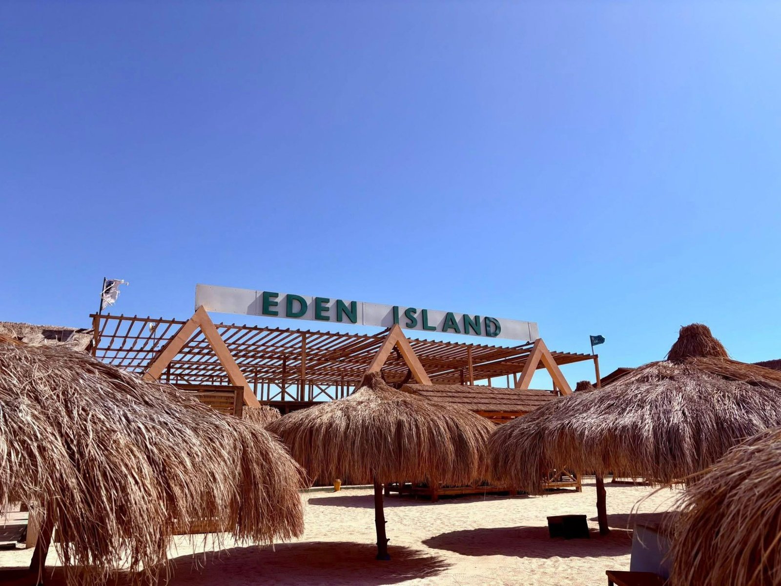 Eden Island Hurghada Red Sea – beach sunbeds palapa umbrellas day trip