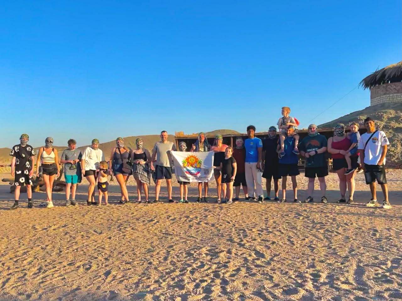 Family enjoying desert adventure near Hurghada — Bedouin experience under the stars Egypt