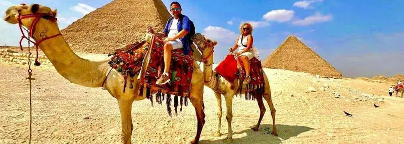 Cairo day trip from Hurghada by flight — camel ride at the Great Pyramids of Giza and Sphinx